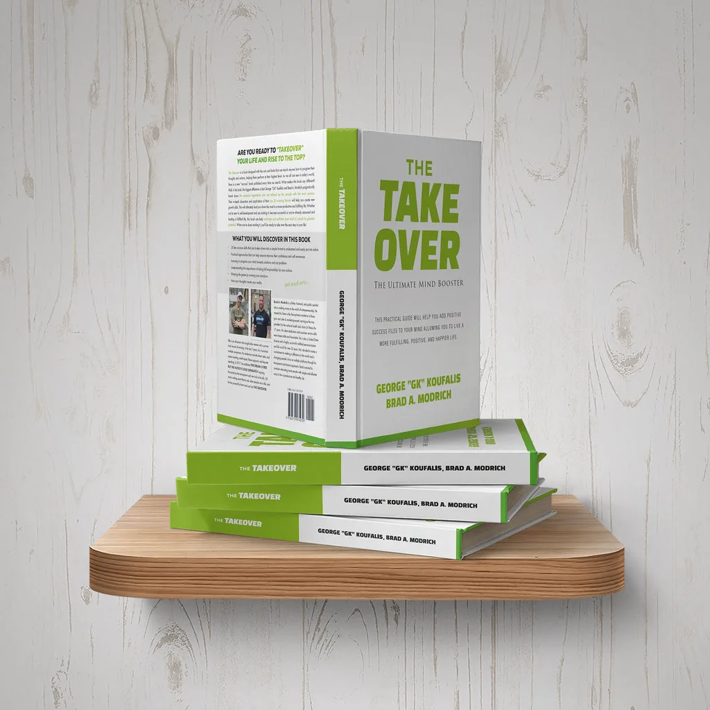 Stacked copies of The Takeover, showing the green spine and bottom-edge band.